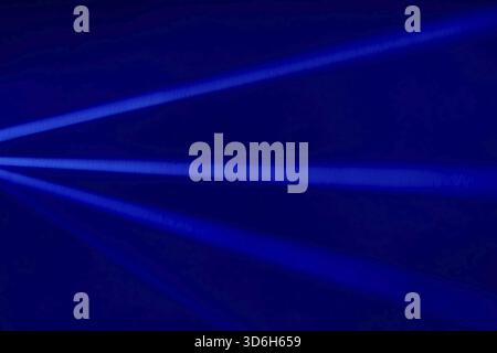 Blue light flare prism rainbow flares overlay effect on black background, light crossing crystals, prismatic sun catcher reflections rays. Abstract bl Stock Photo