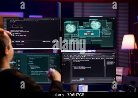 Cybercriminal getting access denied message when trying to infiltrate malware past security. Hacker failing to make script able to hide malicious code from detection systems, getting attack rejected Stock Photo