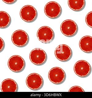 Seamless grapefruit with shade pattern on white surface. Colorful fresh citrus slice pattern. Creative color, summer friuts concept. Minimal style Stock Photo