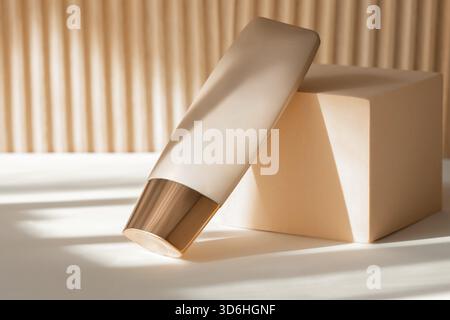 Beauty cream cosmetics makeup product display. Concealer packaging template mock up. Foundation or liquid primer bottle mockup on geometric podium dis Stock Photo
