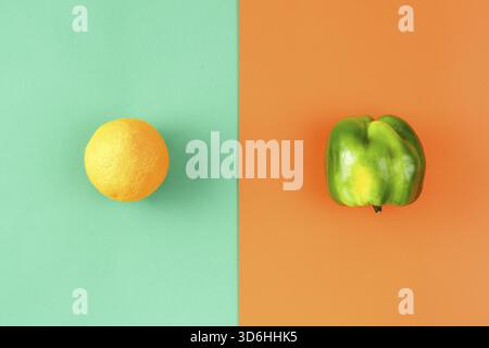 Creative layout made of orange and pepper. Food concept. Fresh grocery trendy flat lay Stock Photo