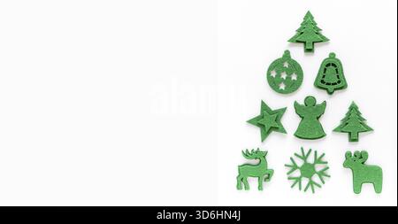 Creative christmas tree layout made from felt decorations. Flat lay, top view, copy space. Holiday festive minimal concept Stock Photo