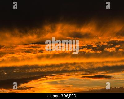 Sunset sky stunning glowing heaven golden clouds Stock Photo