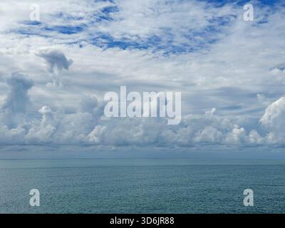 Stunning clouds over blue ocean water Stock Photo