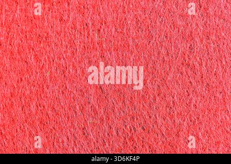 Close-up of red felt. Textured pattern. Stock Photo