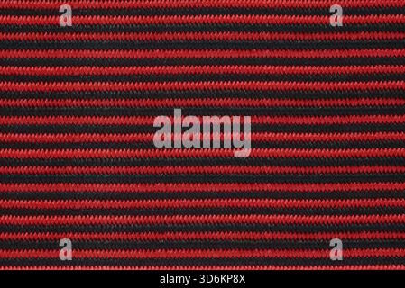woven fabric textile striped black and red background Stock Photo