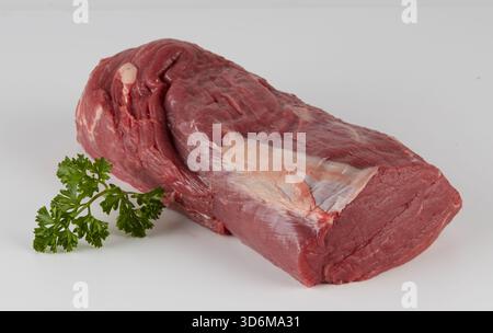 Fresh meat with parsley isolated nature background with clipping path Stock Photo