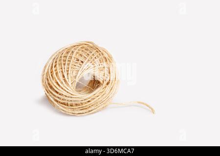 A ball of sisal twine isolated on a white background Stock Photo