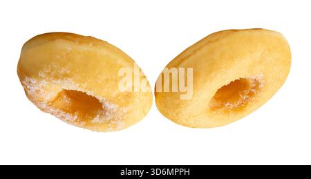 Side view of two brown sugar glazed cinnamon donuts in set is isolated on white background with clipping path. Stock Photo