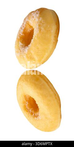 Side view of two brown sugar glazed cinnamon donuts in set is isolated on white background with clipping path. Stock Photo