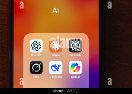 AI assistant apps including ChatGPT, Claude, Perplexity, Grok, DeepSeek and Copilot, highlighting modern AI tools for productivity and research. Stock Photo