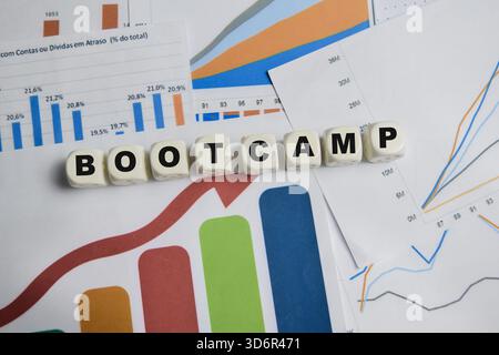 Bootcamp stacked wooden cubes on the table. Stock Photo