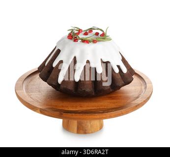 Wooden stand with tasty Christmas cake on white background Stock Photo