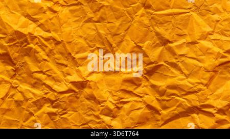 Vintage Decorative Orange Paper with Creased Undulating Pattern Stock Photo