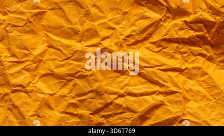 Vintage Decorative Orange Paper with Creased Undulating Pattern Stock Photo
