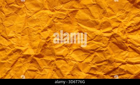 Vintage Decorative Orange Paper with Creased Undulating Pattern Stock Photo
