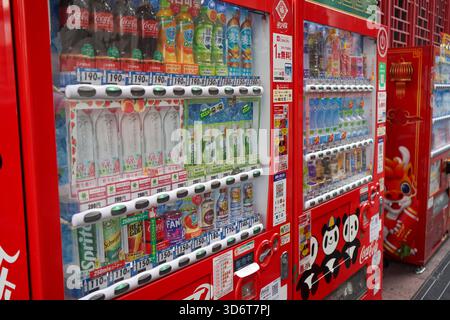 Japanese vending machine selling Coca-Cola drinks and other beverages in Kobe's Chinatown, also called Nankinmachi, with prices shown in yen in Japan Stock Photo