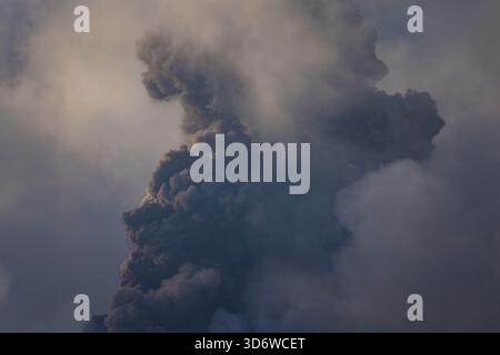 Colossal Ash Plume Rising from Barren Island Volcano Stock Photo