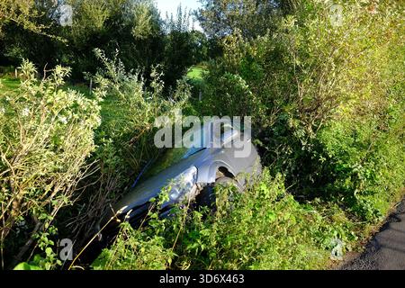 October 2021 - Grey car in the ditch Stock Photo
