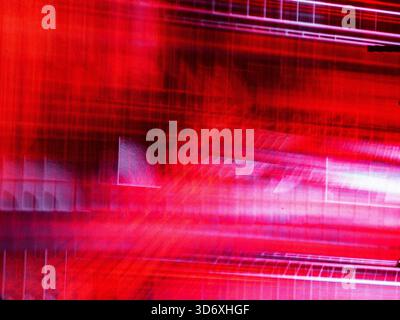 Abstract red digital screen showing interference and dynamic light creating a vibrant texture, representing technology, data, speed, and glitch effect Stock Photo