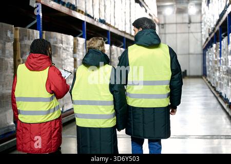 Warehouse workers checking inventory in cold storage chain Stock Photo