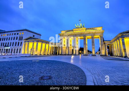 Brandenburg Gate illuminated at dusk in central Berlin, Germany. Stock Photo