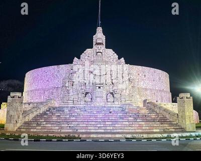 Illuminated night view of Monumento a la Patria in Mérida, Rómulo Rozo’s 1956 Maya-carved tribute glowing with eagle and serpent motifs,Merida,Yucatan Stock Photo