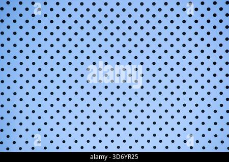 Background of black dots pattern on window, close up Stock Photo
