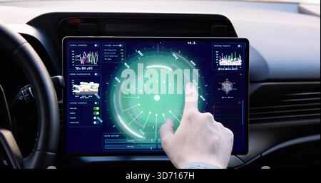 Young Caucasian Man Using Futuristic Touchscreen Technology In Autonomous Car. Stock Photo