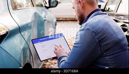 Man Inspects Car Accident Damage, Assesses Cost With Tablet. Vehicle Insurance Adjuster Investigating Online Claims Stock Photo