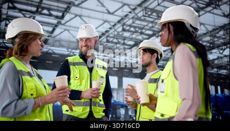 Workers Take A Coffee Break At Power Plant Industrial Facility. Stock Photo