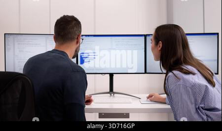 Agile Pair Programming And Extreme Coding: Business Software Development Office Stock Photo