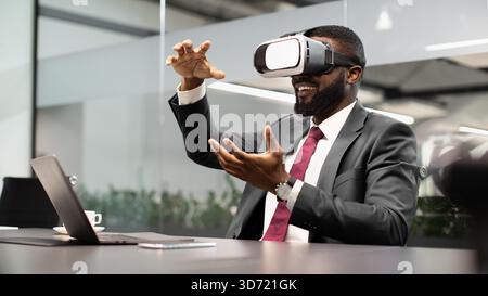 Black businessman testing new technologies for business Stock Photo