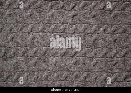 Abstract textured brown knitted background  Stock Photo