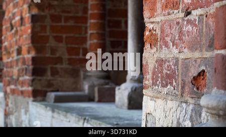 Close-up of Riga Cathedral ancient red brick outdoors facade: historical sample of medieval architecture in Latvia. It epitomizes traditional medieval Stock Photo