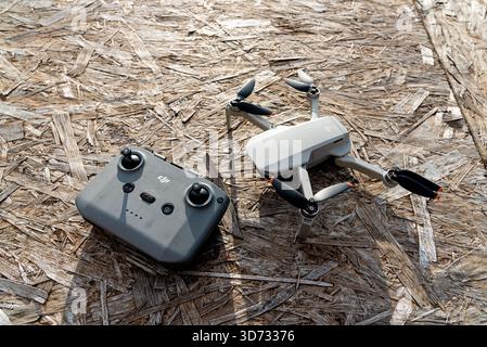 Bar, Montenegro, 2 November 2025, Drone UAV model DJI Mavic Mini and remote controller top view, photography and videography from sky Stock Photo
