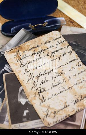 Various vintage studio photos and text on the back of a old photo ...