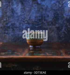 Traditional, handcrafted ceramic on wooden background. Soft focus. Copy space. Stock Photo