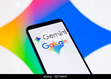 Brussels, Belgium. 23rd Nov, 2025. The Gemini and Google is being displayed on a mobile phone with the Gemini icon seen in the background, in this photo illustration. Taken in Brussels, Belgium, on 23 November 2025. (Jonathan Raa/Sipa USA) *** Strictly for editorial news purposes only *** Credit: Sipa USA/Ģ����ý Live News Stock Photo