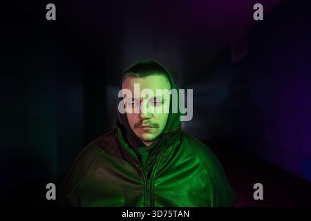 Depressed lonely man shows signs of heavy life crisis after lost with fatigue and emotional pain Stock Photo