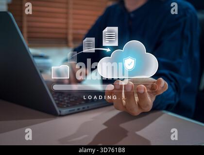 Secure cloud data transfer concept with files uploading to cloud storage via laptop, highlighting cybersecurity, encrypted communication, and digital Stock Photo