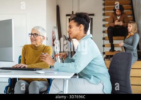 Artificial intelligence and technology development team using laptops, coding and smart solutions Stock Photo