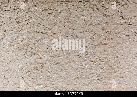mud and stone wall texture Stock Photo