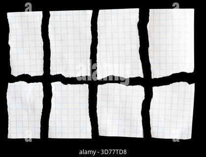 Notebook papers with torn edges on black background Stock Photo