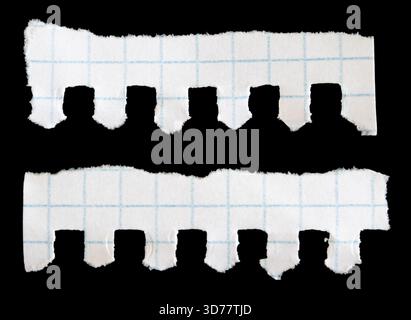 Notebook papers with torn edges on black background Stock Photo