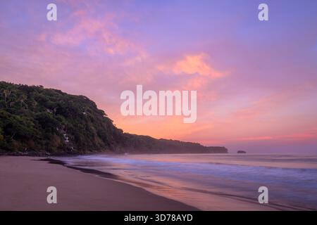 Sunrise clouds at Playa Chacala, Nayarit, Mexico. Stock Photo