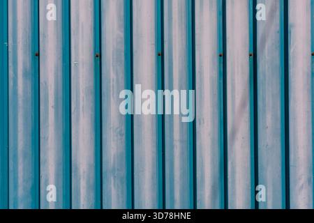 Vertical blue and white striped plank wooden wall Stock Photo