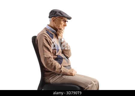 Elderly man sitting and thinking isolated on white background Stock Photo
