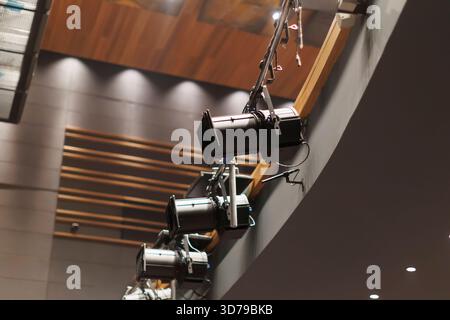 Stage lighting setup in a modern auditorium during preparations for a performance Stock Photo