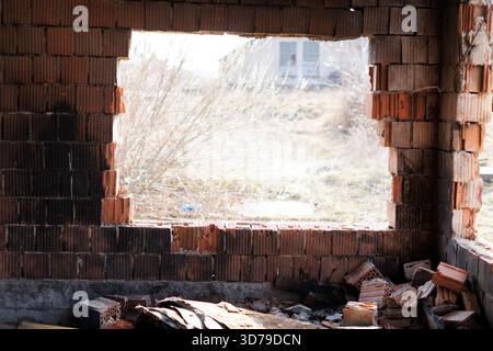 remnants of destroyed building after fire Stock Photo